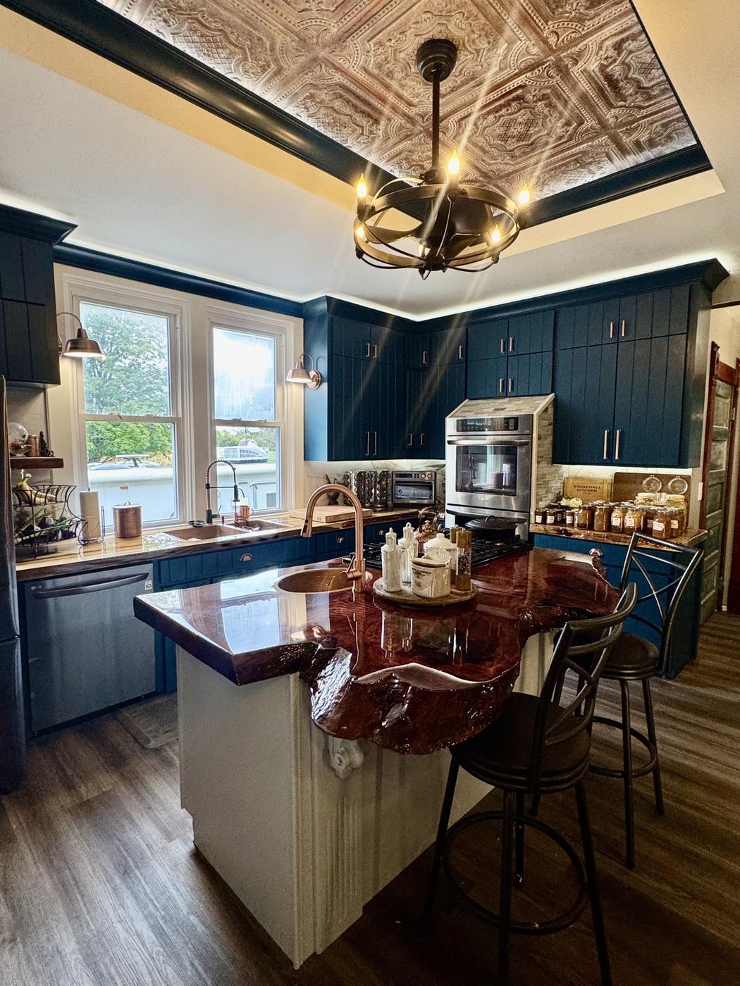Remodeled kitchen with decorative tin ceiling by New Life General Contracting